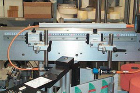 drylin® T rail guide in label feed system for packaging machine
