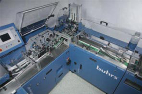 drylin® T rail in enveloping machine